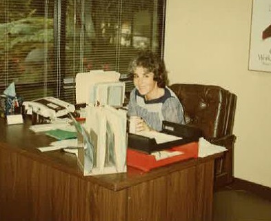 Lucy working away at her desk
