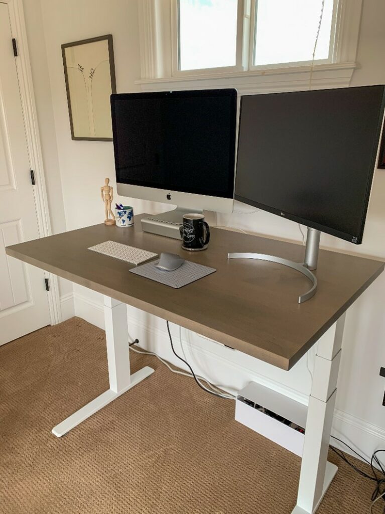 Bristol employee’s home office set-up (adorned with some art from the old office)